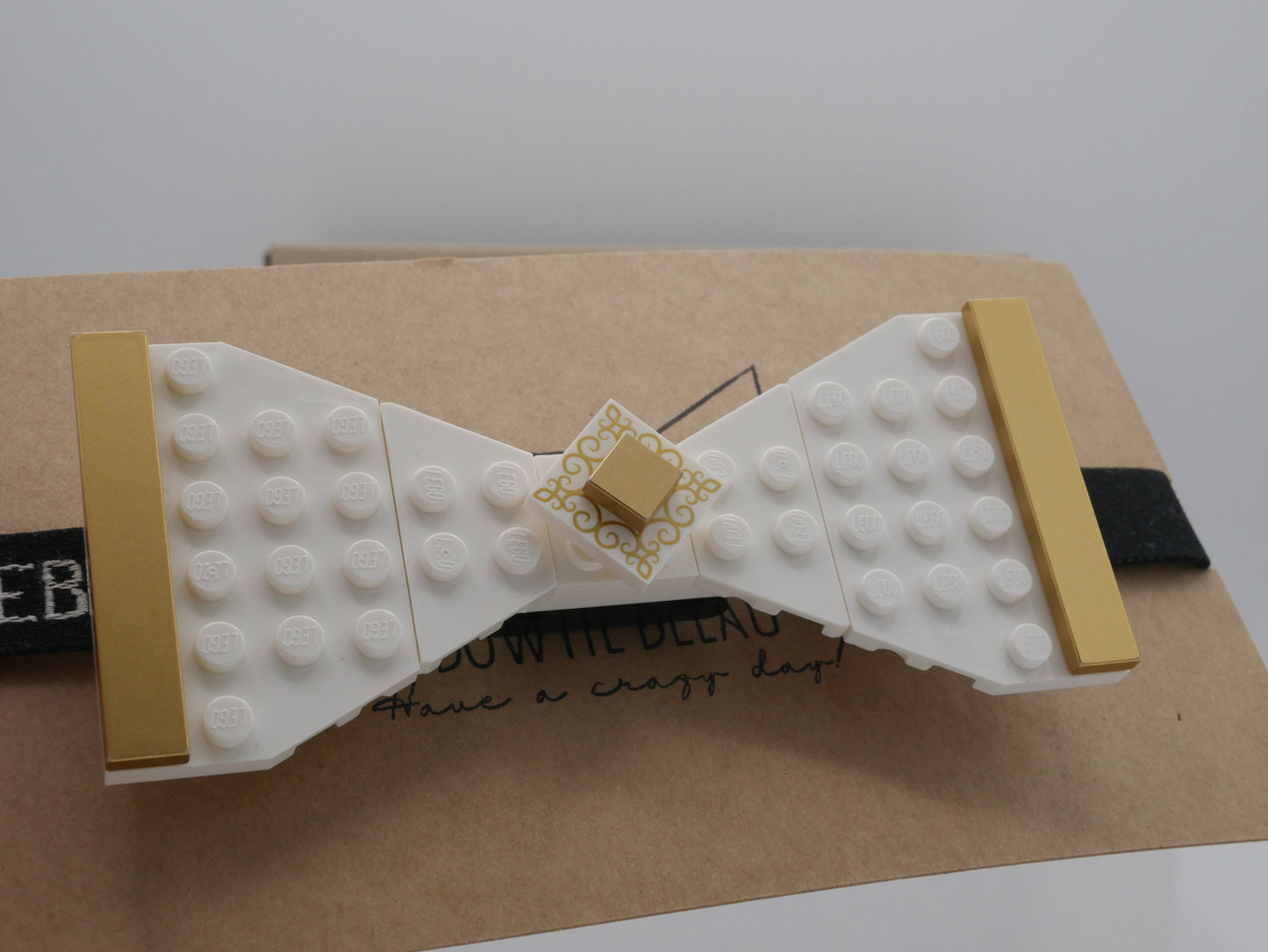 Regal Crest Bow Tie from LEGO bricks metallic gold on white